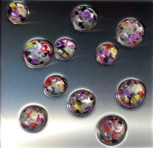 ciclo delle sfere, cm 22x22, semisfere in resina e acciaio, su tavola, 2020