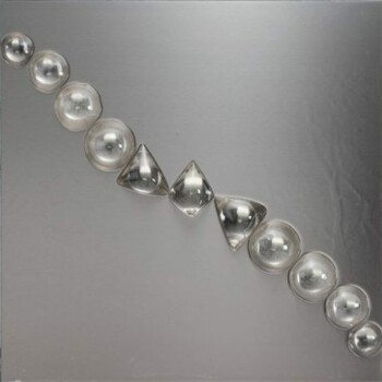 2013, resine, lastra in acciaio, forme in resina inglobate, su tavola, cm 70 x 140